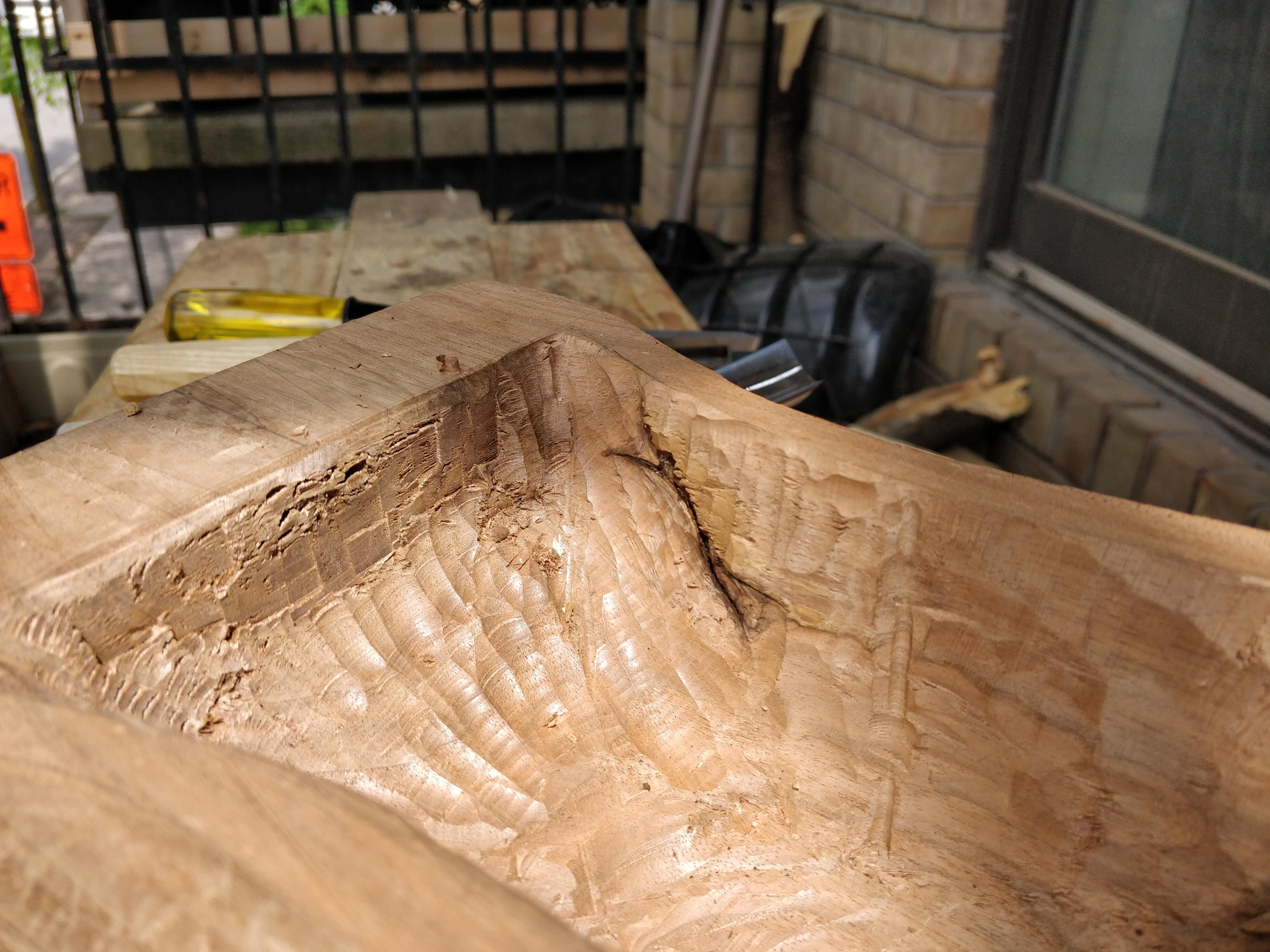 Sarangi body showing gouge marks from carving process.